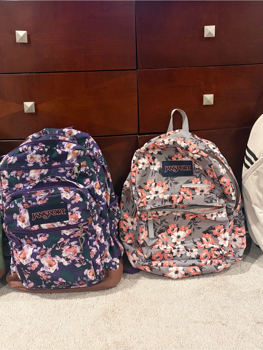 Jansport Floral Backpacks in Purple Floral and Gray Floral